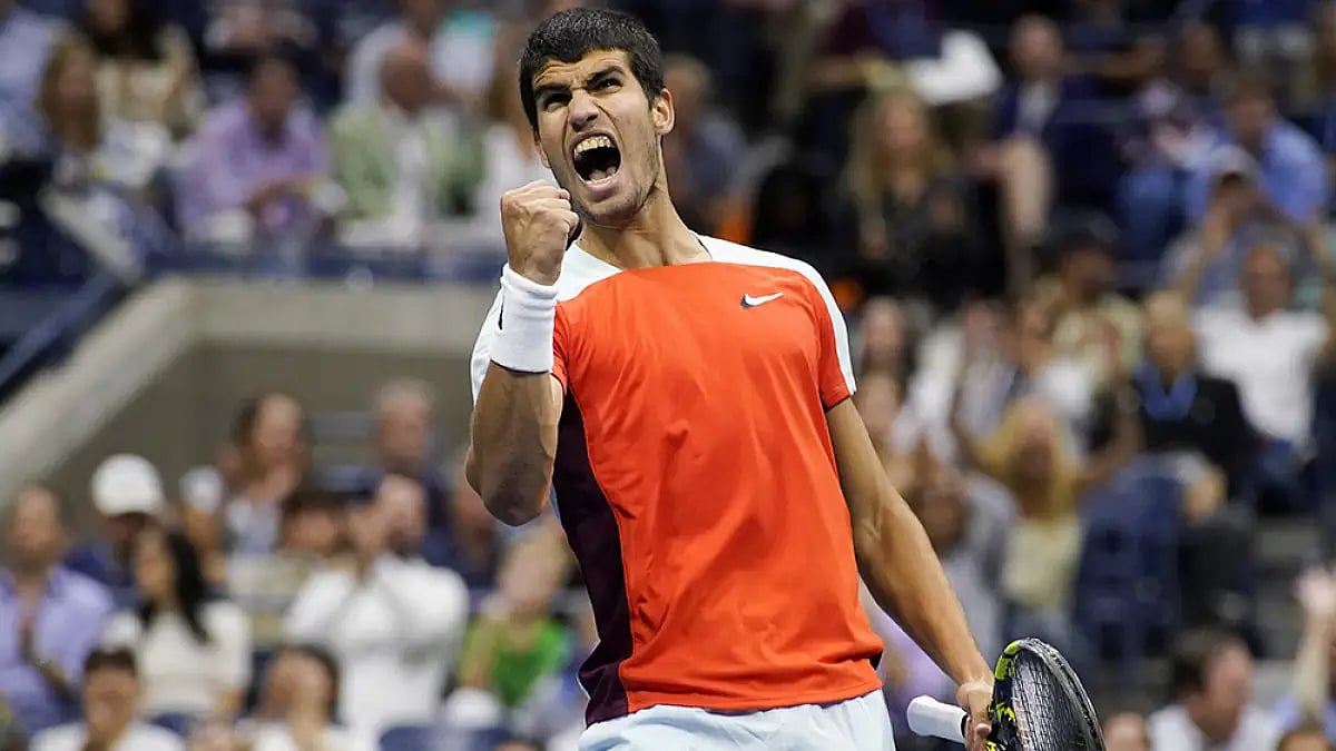 Carlos Alcaraz says he doesn't feel the pressure to topple Djokovic from the top.
