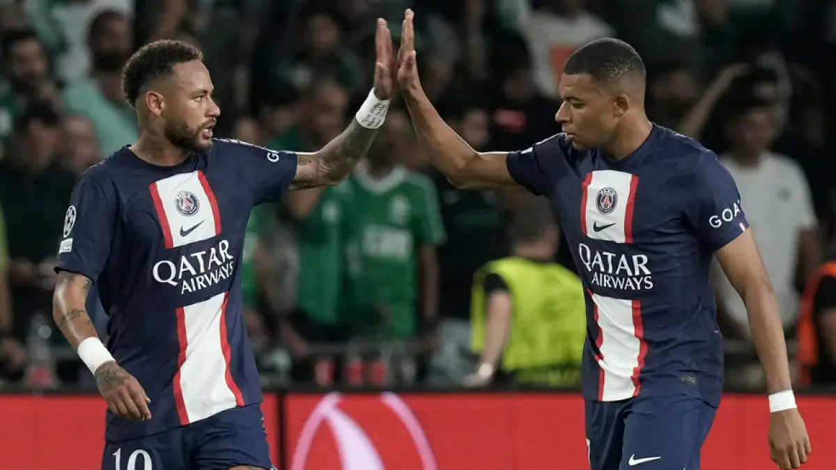 Neymar (L) and Kylian Mbappe celebrate after PSG's second goal against Maccabi Haifa in UCL.