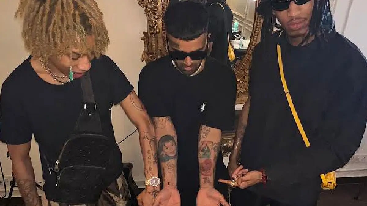 Ayo and Teo with Tattoo Artist 