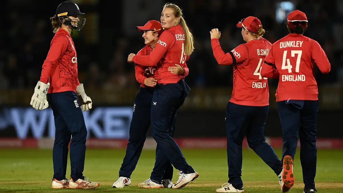 England players celebrate the fall of an Indian wicket in the third T20I on Thursday. 