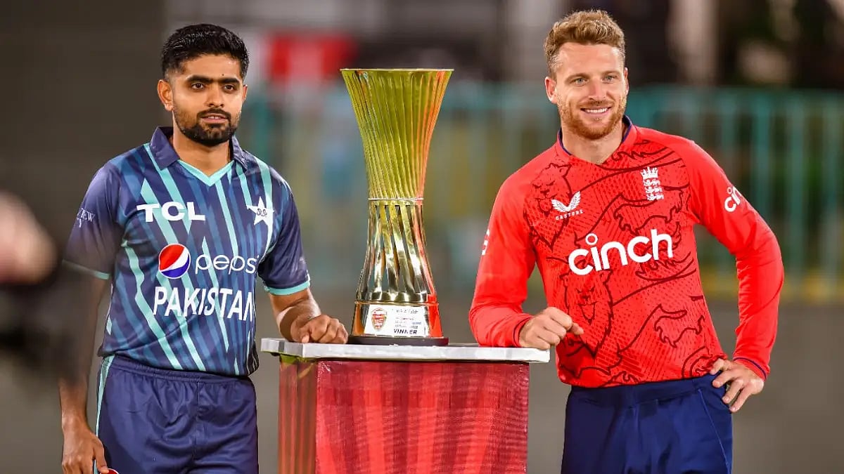 Babar Azam and Jos Buttler pose with the trophy in Karachi ahead of the first T20I.