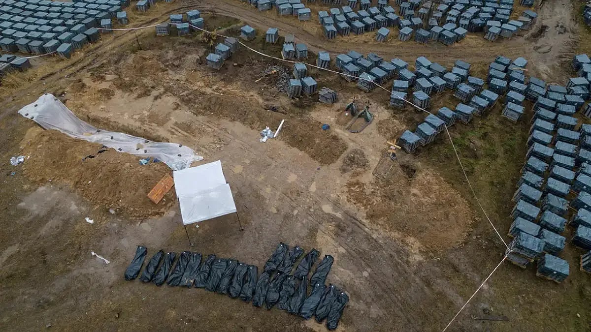 Corpses exhumed from a mass grave in Ukraine's Bucha on the outskirts of Kyiv