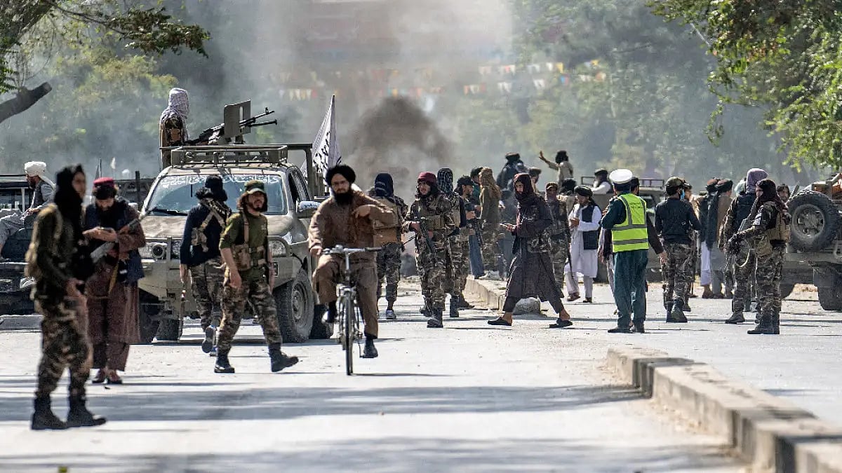 Taliban personnel deployed near the site of blast in Kabul on Friday