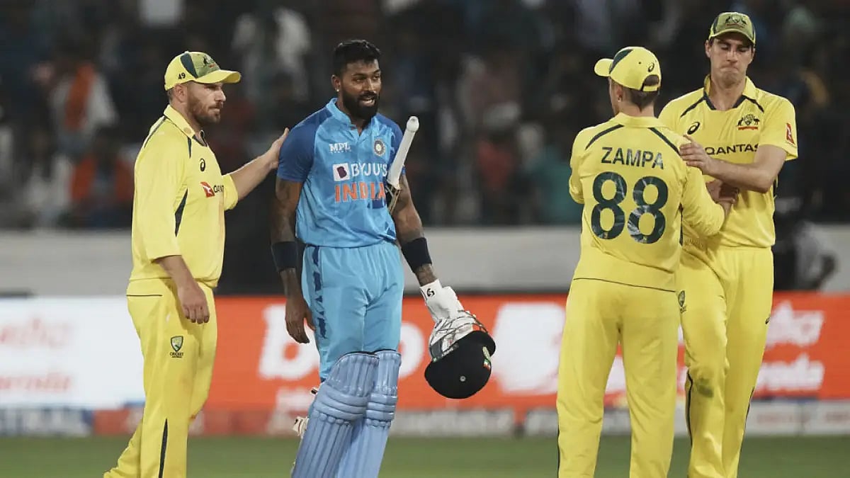 Australia's captain Aaron Finch, left, congratulates India's Hardik Pandya after the end of 3rd T20I