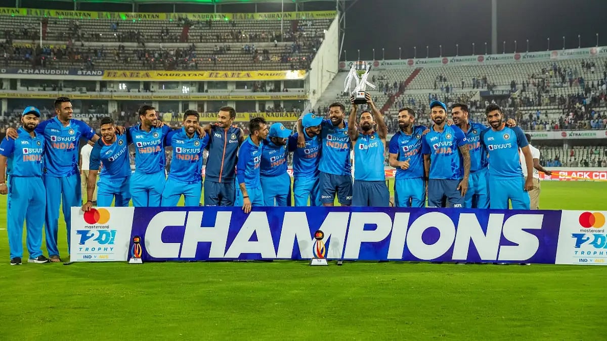 Indian players celebrate after winning the T20I series against Australia.  