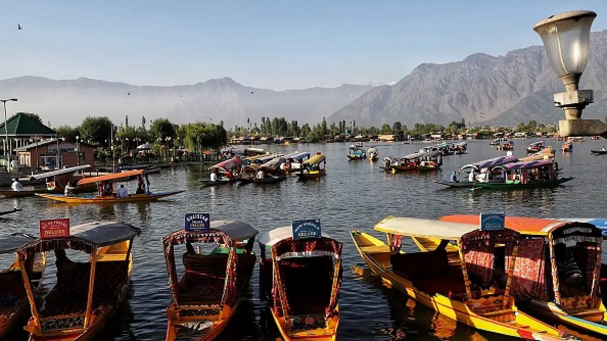 Tourists enjoy shikara ride in Dal Lake, Srinagar.
