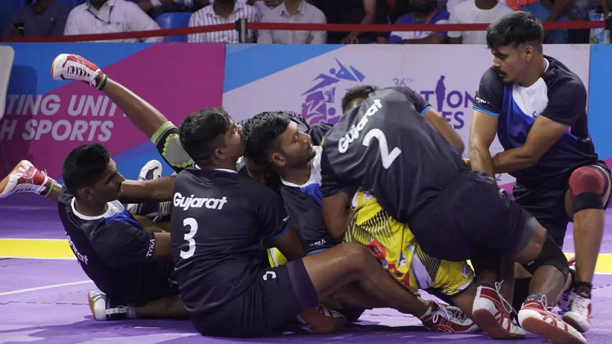 Players in action during Gujarat vs Goa, men's kabaddi match in Ahmedabad, September 26, 2022.