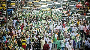 Janata Dal United (JDU) activists during a procession in Bihar's Patna.