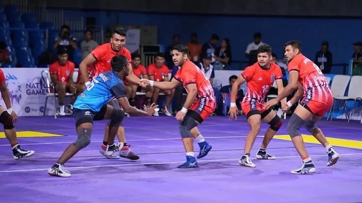 Action during Services vs Tamil Nadu kabaddi match at the National Games 2022.  