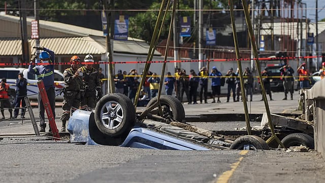 Rescuers Searching For People Caught In Sinkhole In Guatemala