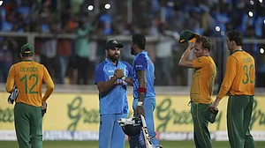 India's captain Rohit Sharma congratulates KL Rahul after their win against South Africa.