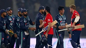 England and Pakistan players greet each other after the end of the fifth T20I in Karachi.