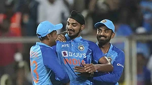 India's Arshdeep Singh, center, celebrates the dismissal of South Africa's David Miller.