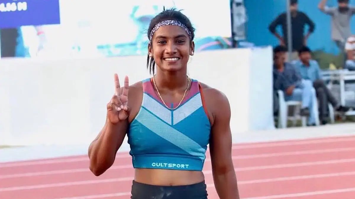 Rosy Meena Paulraj of Tamil Nadu poses after willing the pole vault gold at National Games 2022. 
