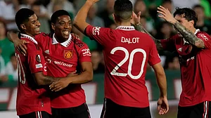 Manchester United players celebrate a goal against Omonia in UEFA Europa League match.