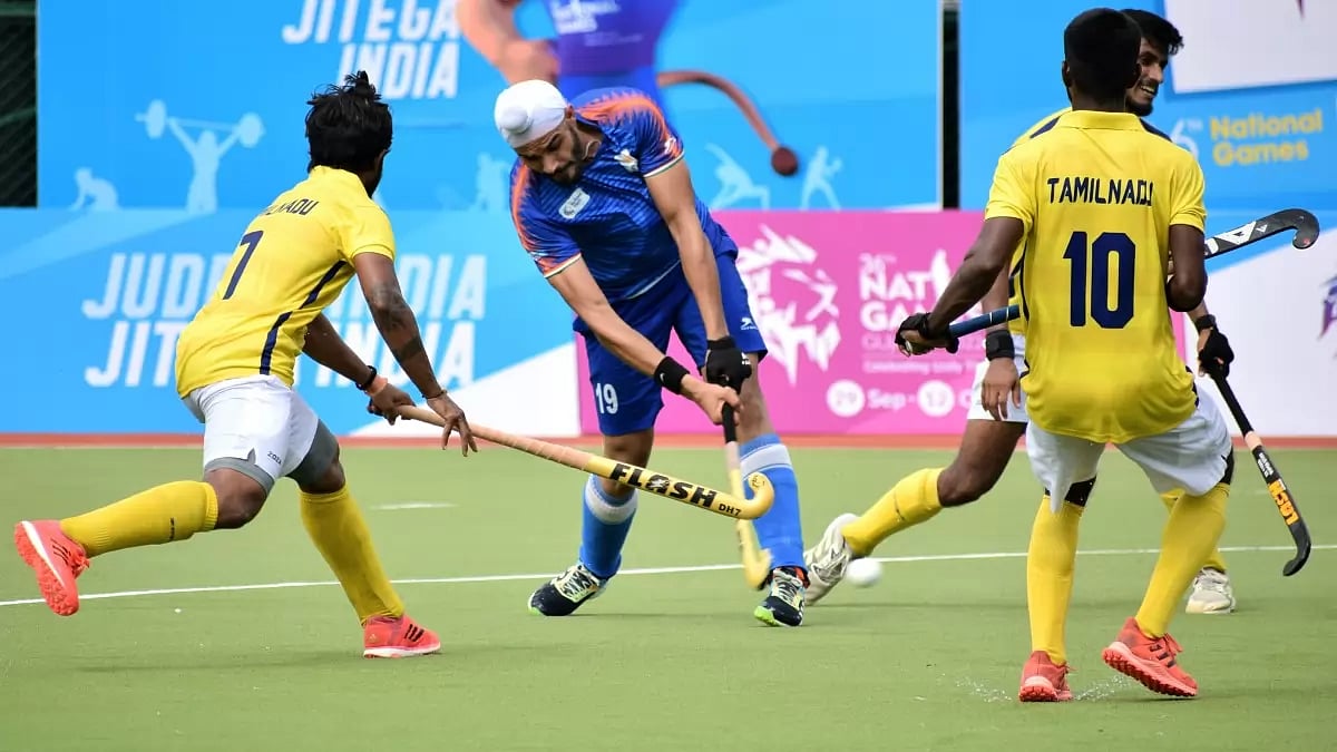 Action during hockey quarterfinal match between Tamil Nadu and Haryana at National Games 2022. 