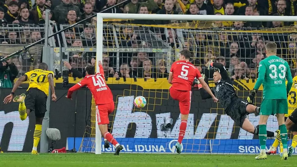Modeste scored late on as Borussia grabbed a draw against rivals Bayern Munich.