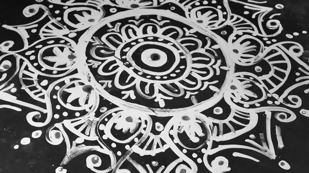 Alpona drawn on the occasion of Kojagori Lakshmi Puja