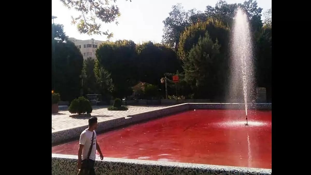 The fountain at Park Daneshjoo in the Iranian capital Tehran on Friday, coloured red in protest
