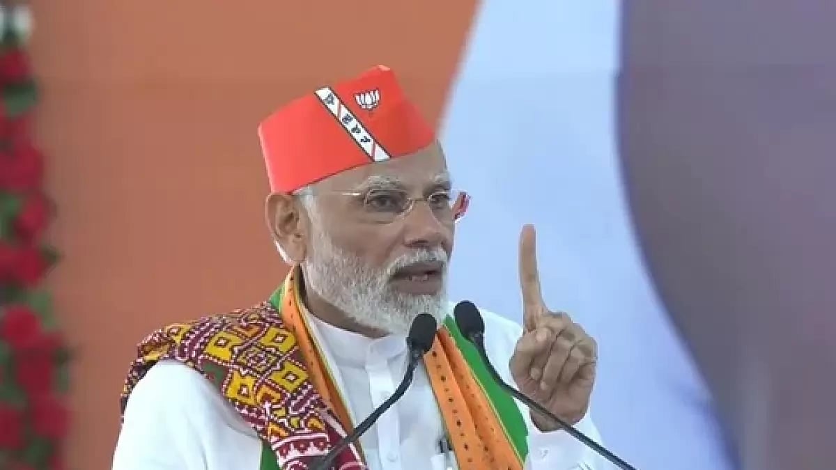 PM Modi addresses a gathering in Anand, Gujarat, on Monday.