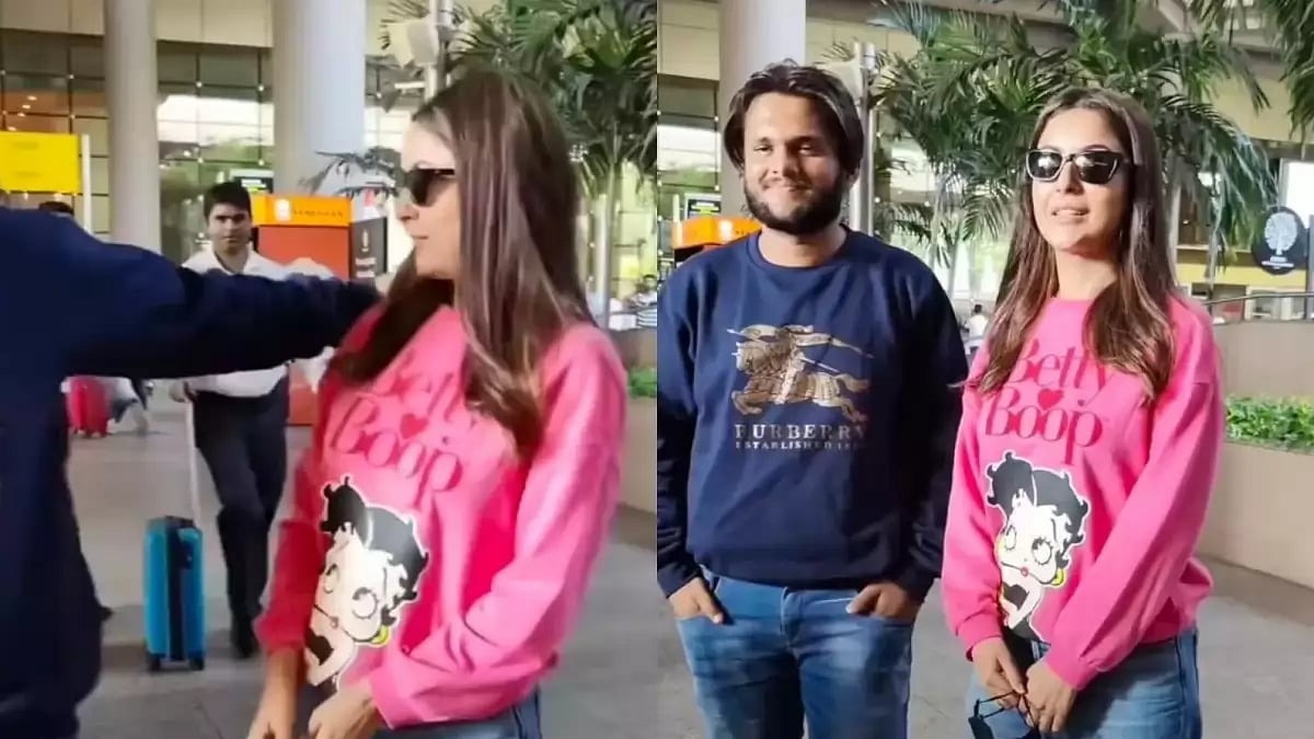 Shehnaaz Gill with a fan at the Mumbai airport