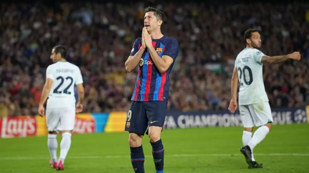 Barcelona's Robert Lewandowski reacts after scoring against Inter Milan in UEFA Champions League. 