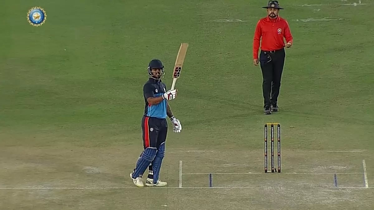 Delhi's Nitish Rana celebrates after completing his century against Punjab in Syed Mushtaq Ali tie.