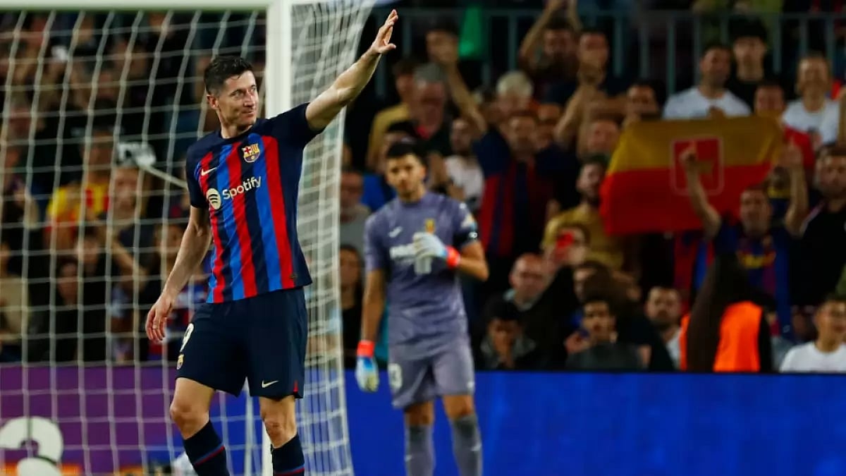 Barcelona's Robert Lewandowski celebrates after scoring against Villarreal in LA Liga 2022-23.
