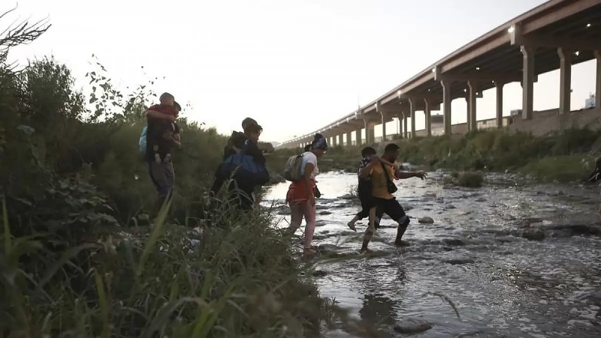 Migrants undertake dangerous journeys to attempt crossing into the US. - null