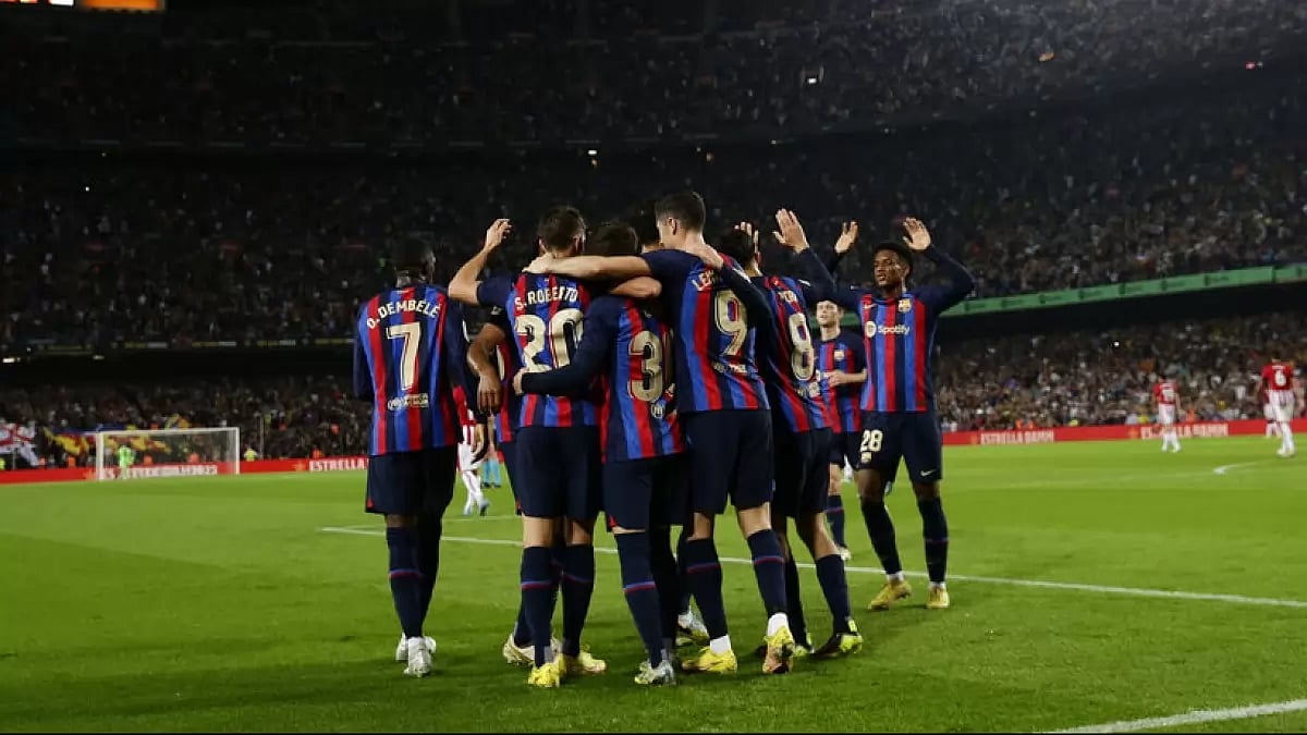 Barcelona players celebrate after scoring a goal against Athletic Bilbao in La Liga 2022-23.