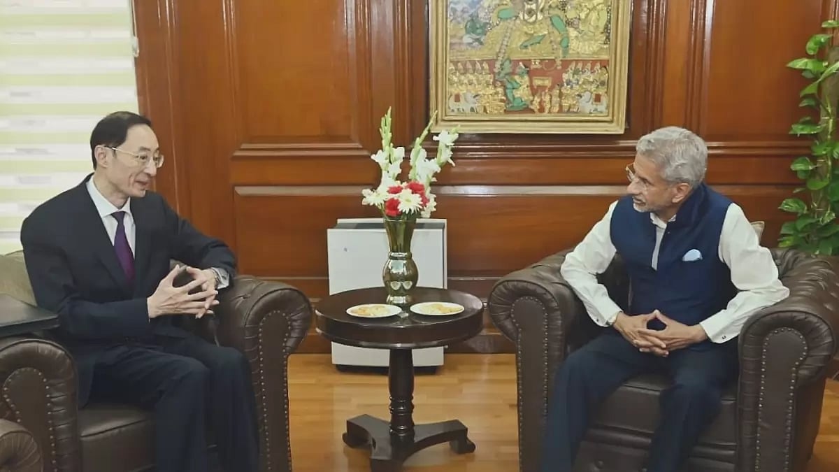 Indian EAM S.Jaishankar (R) with Chinese Envoy Sun Weidong