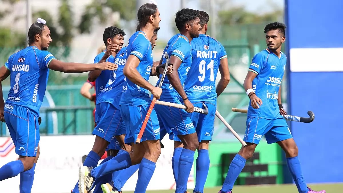 Indian players celebrate after scoring against Great Britain. 