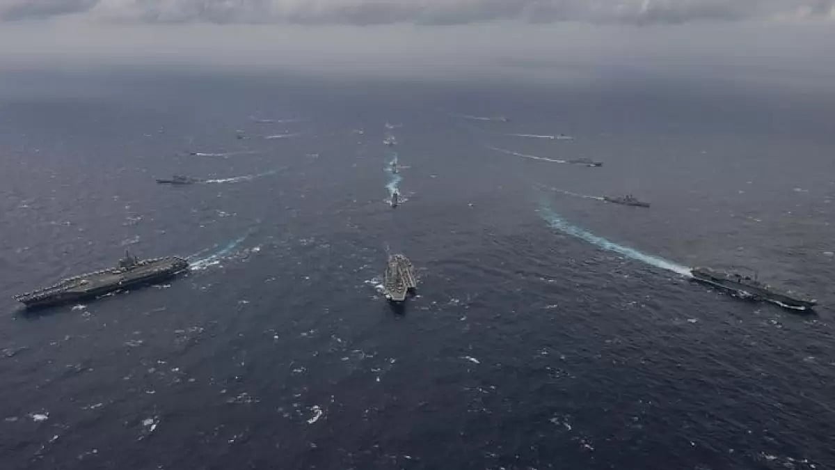 Exercise Malabar, with Indian, American, Australian and Japanese warships in formation 