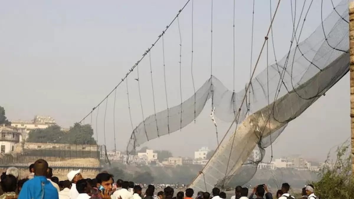 The collapsed suspension bridge in Gujarat's Morbi