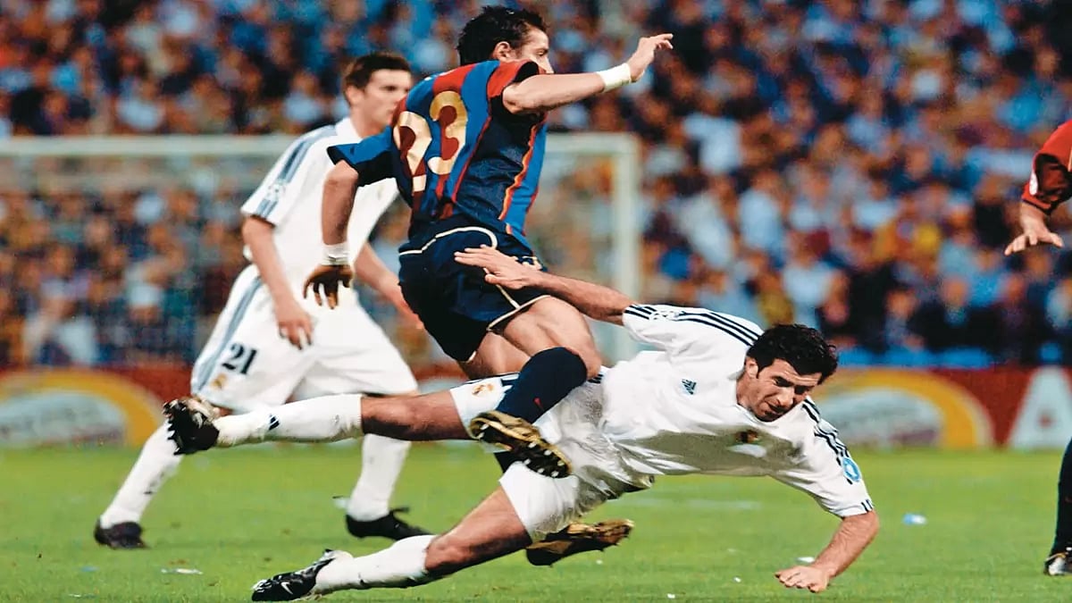 Victim of fanmania: Portugal star Luis Figo was booed for changing team