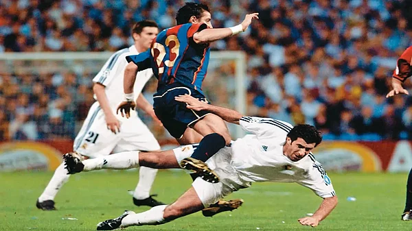 Victim of fanmania: Portugal star Luis Figo was booed for changing team