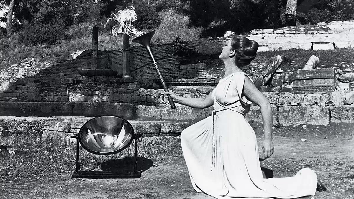 Lighting the Flame: Greek actress Maria Moscholiou doing the honours at Olympia in 1980 