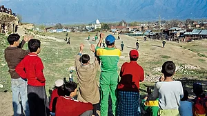 Provocation: Kashmiri students dressed in Pakistan jerseys playing cricket in Srinagar