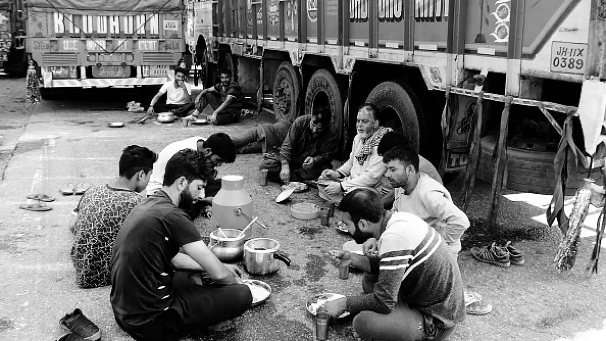 Three trucks loaded to the brim with not-so-fresh vegetables and fruits...