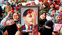 In High Esteem: Muslim women holding a framed photograph of Dr. B.R. Ambedkar during anti-CAA protes