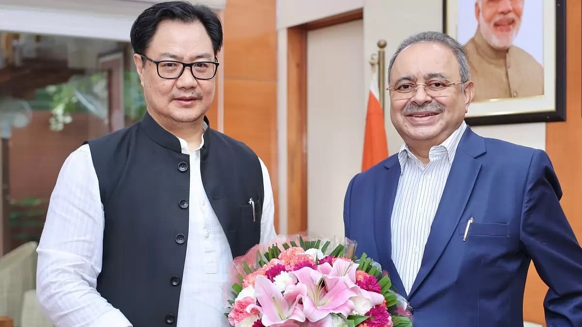 Union Law Minister Kiren Rijiju and retired Justice Ritu Raj Awasthi 