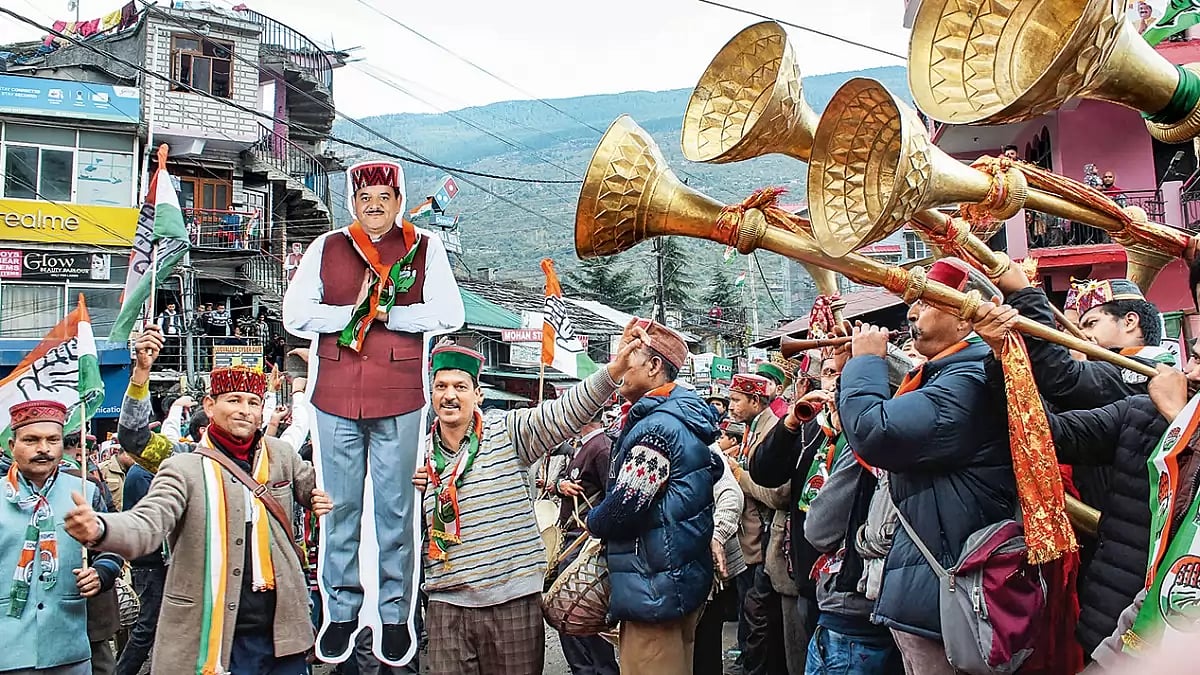 Upbeat mood: Supporters of Congress candidate Sunder Singh Thakur in Kullu