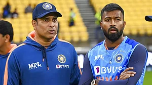 India's stand-in coach VVS Laxman pictured with captain Hardik Pandya during the 1st T20I.