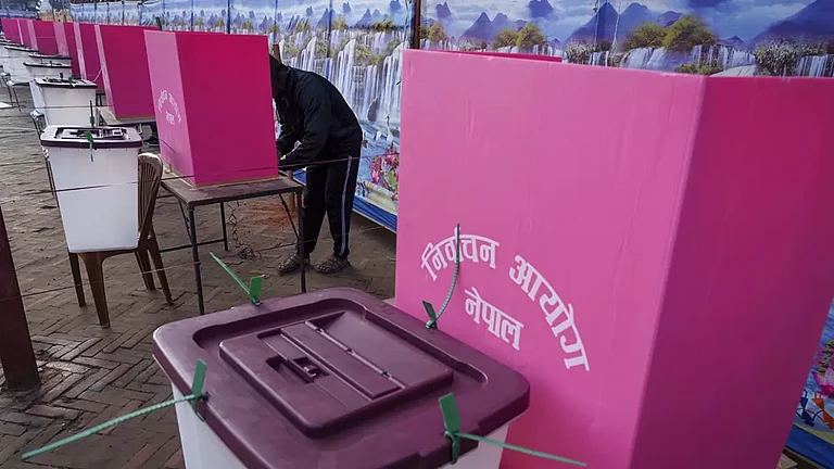 A man casts his vote during the general election in Kathmandu, Nepal. - File photo; Representative image