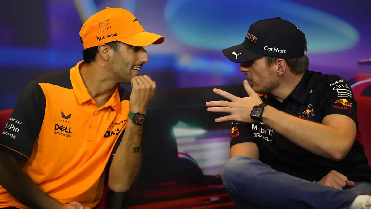 Daniel Ricciardo and Red Bull's Max Verstappen engaged in a conversation in Abu Dhabi.