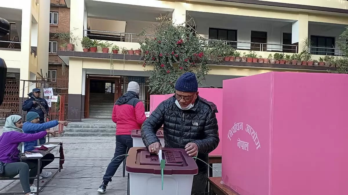 A man casts his vote during the Nepal Parliamentary and Provincial Assembly elections on November 20
