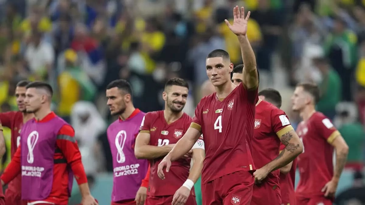 Serbian players acknowledge the crowd after their 2-0 loss to Brazil.