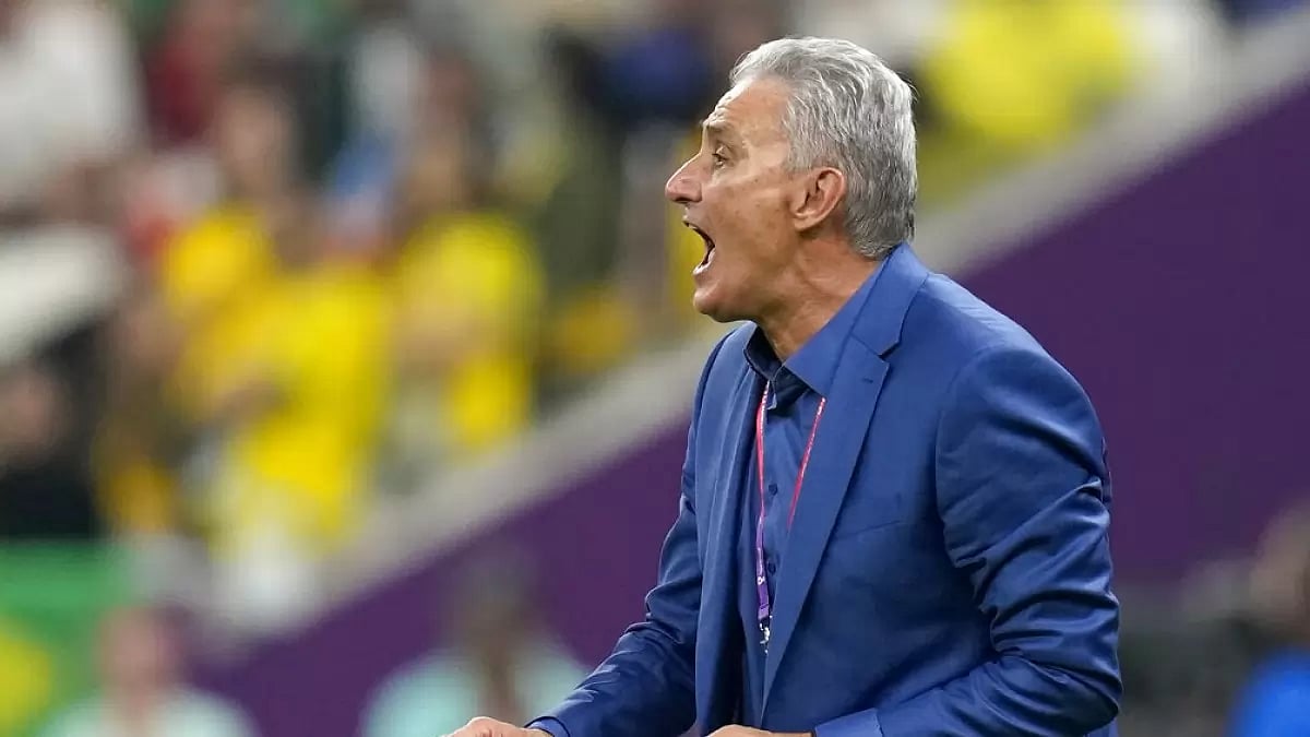 Brazil's coach Tite shouts instructions during his team's match against Serbia.