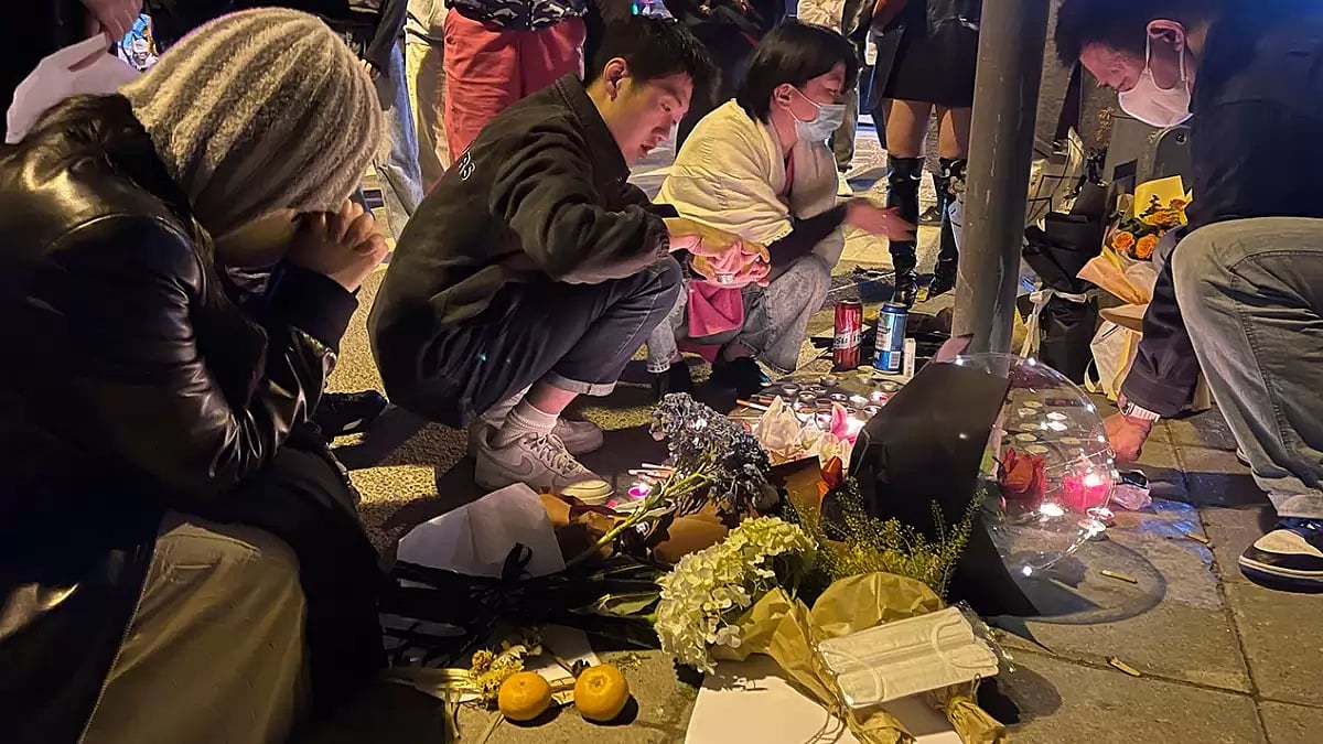 Residents mourn the victims of deadly fire that killed 10 people 