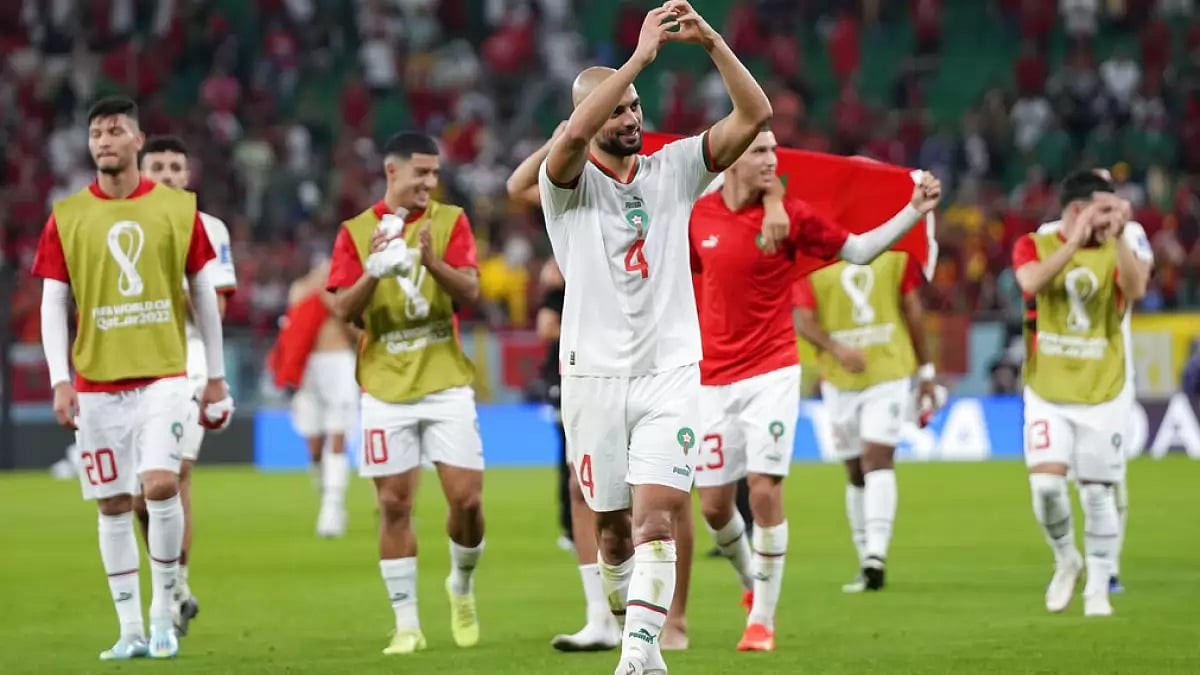Sofyan Amrabat celebrates his the win with his teammates.